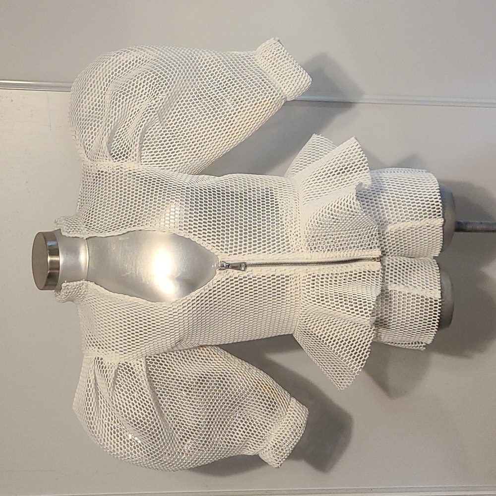 Couture by celb.designer Maggie Barry's custom-made two-pie jacket & mesh shorts